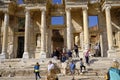 Tourists in front of the ruins of the Library of Celsus