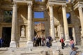 Tourists in front of the ruins of the Library of Celsus