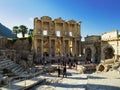 Tourists visiting the ruins Celsius Library of the ancient city, Ephesus, Turkey