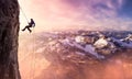 Epic Adventurous Extreme Sport Composite of Rock Climbing Man Rappelling Royalty Free Stock Photo