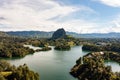 Drone shot of gigantic boulder with nature landscape surrounding it