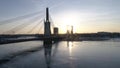 Epic bridge shot with traffic and sunset behind the buildings 4K 50FPS