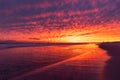 Epic colorful sunset sky reflecting in the ocean on a peaceful beautiful beach. Fire Island New York