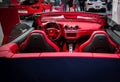 Epic convertible luxurious sports Ferrari car - Beautiful red Ferrari interior Royalty Free Stock Photo