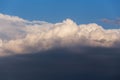 Epic cumulus fluffy white clouds in sunlight against blue sky background, heaven texture Royalty Free Stock Photo