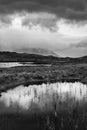 Epic dramatic  black and white landscape image of Loch Ba on Rannoch Moor in Scottish Highlands on a Winter morning Royalty Free Stock Photo