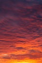 Epic Dramatic bright sunrise, sunset orange red pink sky with beautiful clouds in sunlight background texture Royalty Free Stock Photo