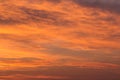 Epic Dramatic bright sunrise, sunset orange yellow red sky with clouds in sunlight background texture Royalty Free Stock Photo