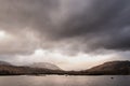 Epic dramatic landscape image of Loch Ba on Rannoch Moor in Scottish Highlands on a Winter morning Royalty Free Stock Photo