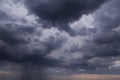 Epic Dramatic Storm sky with dark grey cumulus rainy clouds with rain background texture, thunderstorm Royalty Free Stock Photo