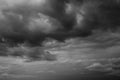 Epic Dramatic Storm sky, dark grey rainy clouds with wind, abstract background texture, thunderstorm. Black and white photo Royalty Free Stock Photo