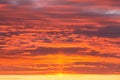 Epic dramatic sunset, sunrise orange sky with clouds and sunlight background Royalty Free Stock Photo