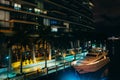 The Epic Hotel and a boat in the Miami River at night, in downtown Miami, Florida. Royalty Free Stock Photo