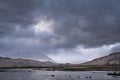 Epic dramatic landscape image of Loch Ba on Rannoch Moor in Scottish Highlands on a Winter morning Royalty Free Stock Photo