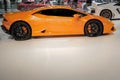 Epic orange Lamborghini Huracan inside Dubai Motor show Royalty Free Stock Photo