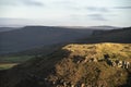 Epic Peak District National Park during late Summer morning with stunning light across the hills