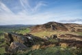 Epic Peak District Winter landscape of Ramsaw Rocks viewed from Hen Cloud with beautiful sunset sky