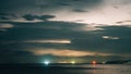 Epic photo of the sky over the sea with lightning in the clouds. Spectacular nature show. Long exposure photography Royalty Free Stock Photo