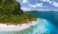 Epic Pinagbuyutan Island, El Nido, Palawan, Philippines. Aerial drone view of remote secluded tropical white sandy beach Royalty Free Stock Photo