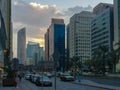 Epic shot of Abu Dhabi city towers, streets and cloudy sunset