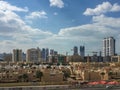 Epic shot of Dubai city on a cloudy day - view from a balcony tower