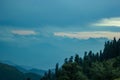 Epic shot of green and snowy mountains