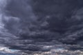 Epic storm sky with many dark grey cumulus rainy clouds background texture, thunderstorm, wind weather Royalty Free Stock Photo