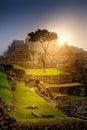 Epic sunrise over the Machu Picchu city ruins covered with fog