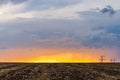 Epic sunset with rural landscape with high-voltage line Royalty Free Stock Photo