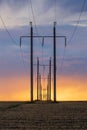 Epic sunset with rural landscape with high-voltage line Royalty Free Stock Photo