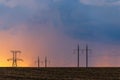 Epic sunset with rural landscape with high-voltage line Royalty Free Stock Photo