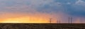 Epic sunset with rural landscape with high-voltage line Royalty Free Stock Photo