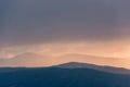 Epic Winter landscape image of view along Rannoch Moor during heavy rainfall giving misty look to the scene Royalty Free Stock Photo