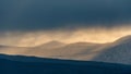 Epic Winter landscape image of view along Rannoch Moor during heavy rainfall giving misty look to the scene Royalty Free Stock Photo