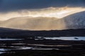 Epic Winter landscape image of view along Rannoch Moor during heavy rainfall giving misty look to the scene Royalty Free Stock Photo