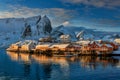 Epic winter seascape from Norway shot at sunrise with dynamic sky and pretty mountain