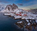 Epic winter seascape from Norway shot at sunrise with dynamic sky and pretty rocks