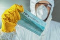 Epidemiologist holding Coronavirus respiratory mask Royalty Free Stock Photo