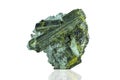 Epidote isolated on white background. Calcium aluminium iron sorosilicate mineral.