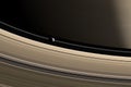 Epimetheus, inner satellite of Saturn, orbiting in the Saturn rings. 3d render