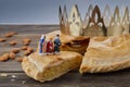 Epiphany cake, French Galette de rois with figure of three kings.