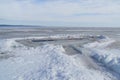 Epiphany ice font in frozen lake in spring when ice began to melt Royalty Free Stock Photo