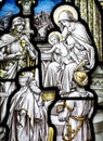 The Epiphany in stained glass (three kings visiting baby Jesus) Royalty Free Stock Photo