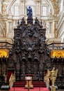 Episcopal throne in the area of the choir stalls of the Mosque-Cathedral of Cordoba in Spain. Royalty Free Stock Photo