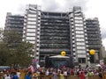 EPM headquarters with people celebrating Feria de las Flores, flower fair Royalty Free Stock Photo