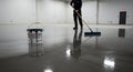 Epoxy Floor Coating Application: Professional Installation, Smooth Surface, Durable Finish Royalty Free Stock Photo