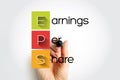 EPS Earnings Per Share - monetary value of earnings per outstanding share of common stock for a company, acronym text with marker