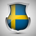 EPS10 Vector Patriotic shield with flag of Sweden Royalty Free Stock Photo