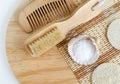 Epsom bath salts foot soak, wooden hair brush, loofah sponge and massage body brush. Natural spa, beauty treatment, zero waste Royalty Free Stock Photo