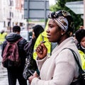 Black Woman Standing Alone Talking On Mobile Phone